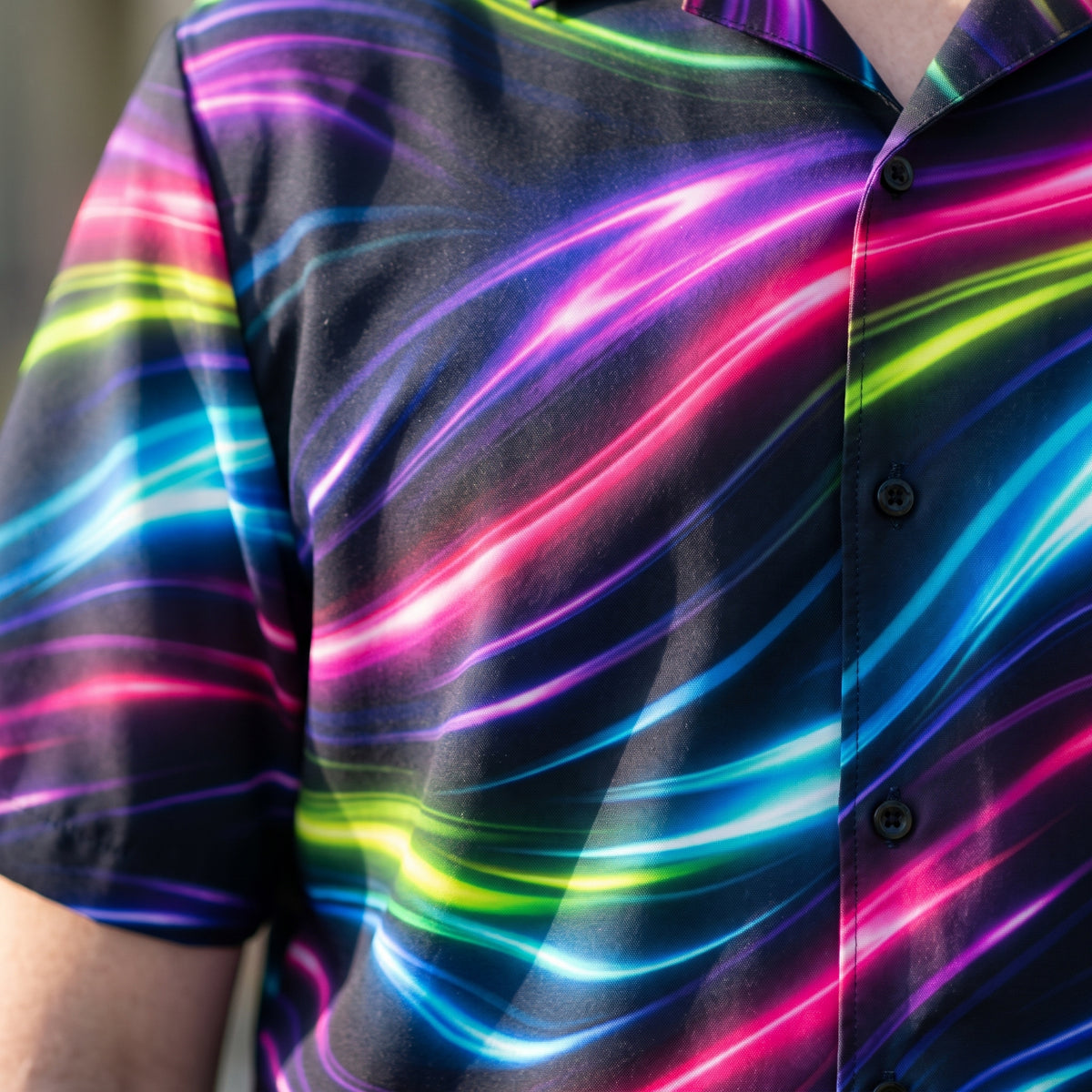 Close-up of the Neon Flow printed fabric and button placket on the shirt front