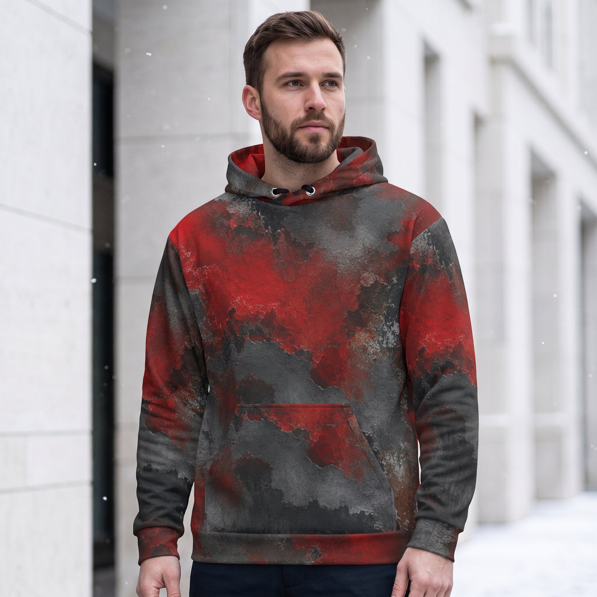 Man wearing the Red & Black Abstract hoodie, red and black print