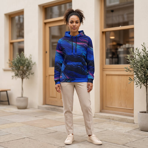 Woman wearing the Cobalt Afterglow hoodie – cobalt blue, turquoise and magenta wave print