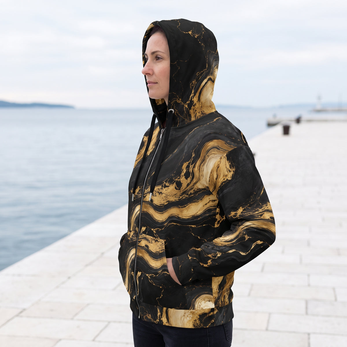 Woman wearing the Golden Oro all-over print zip hoodie