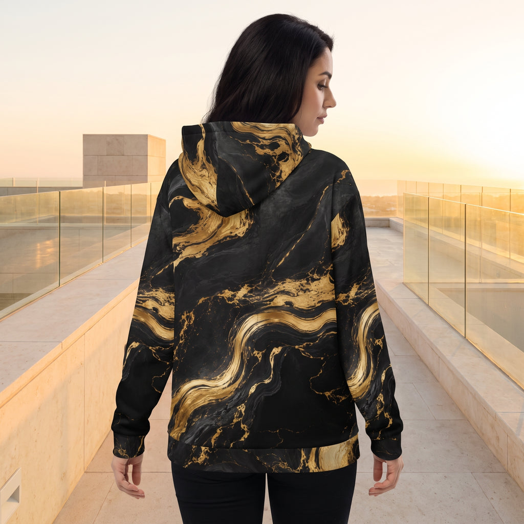 Woman wearing the Golden Oro zip hoodie – black and gold marble print