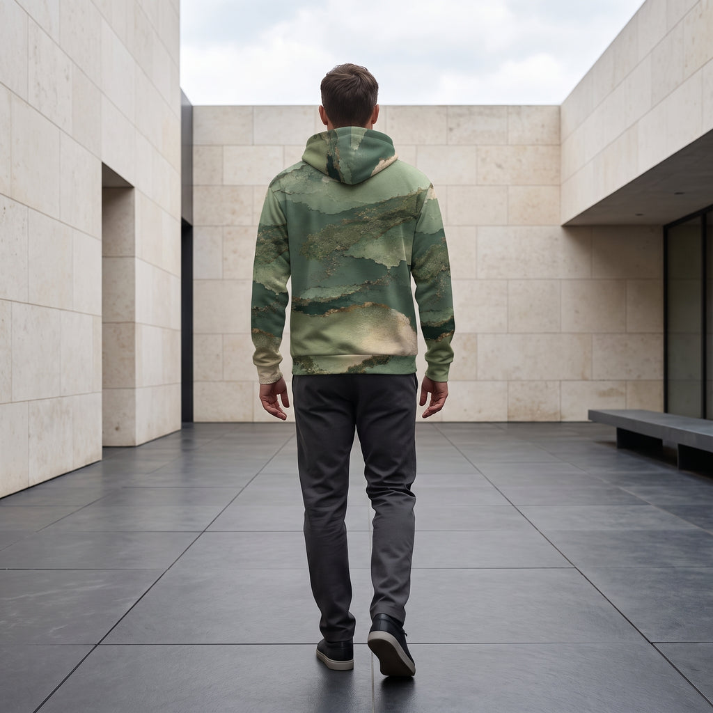 Man walking in the Verdant Terrain hoodie, sage and olive print