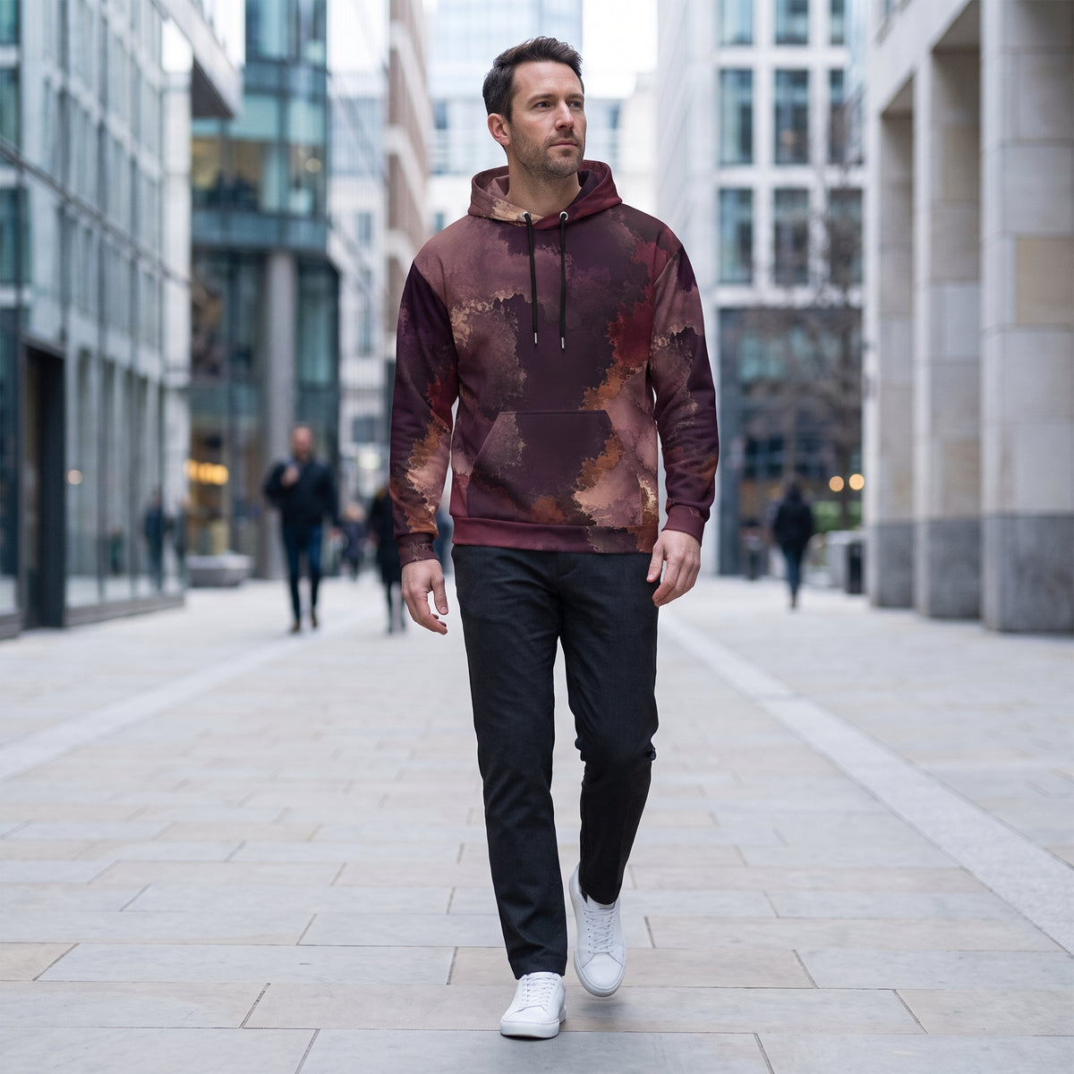 Man wearing the Ember Eclipse all-over print hoodie