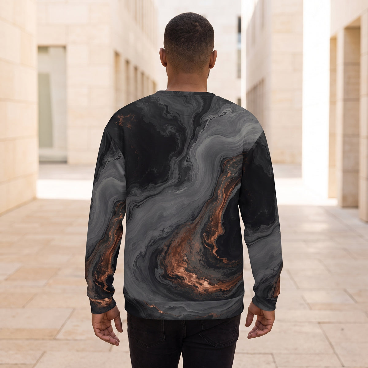 Man walking in the Molten Obsidian all-over print sweatshirt on a promenade