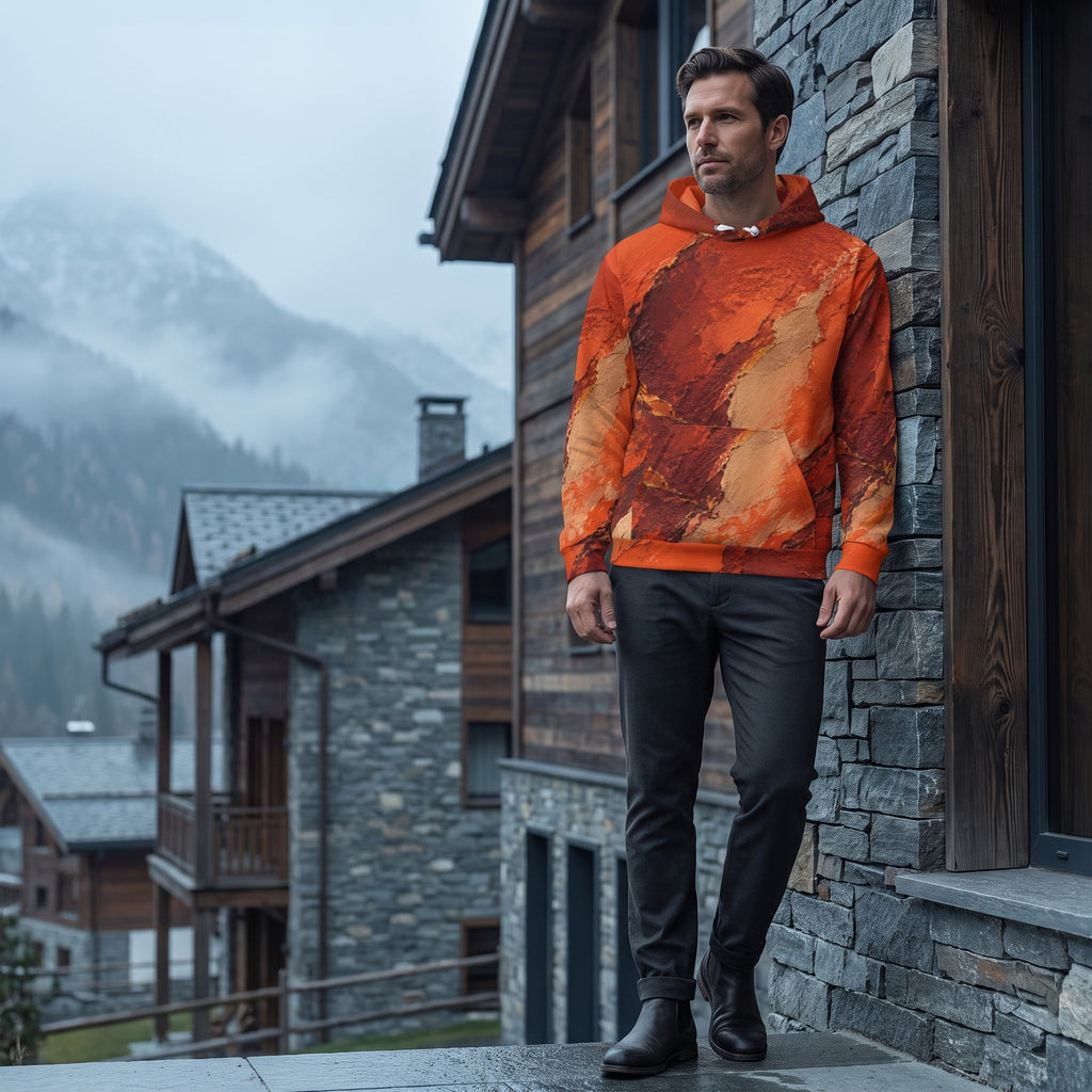 Man wearing the Ember Terrain all-over print hoodie