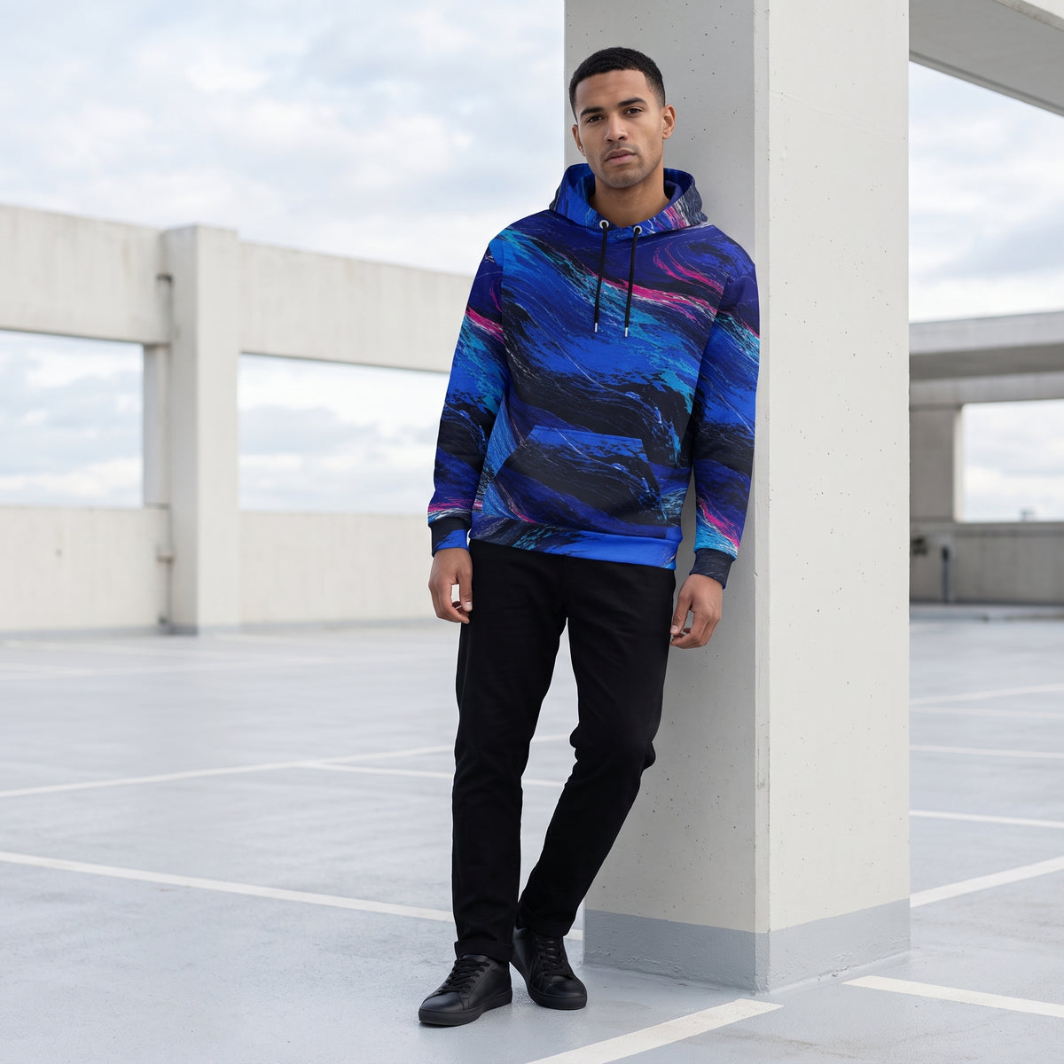 Man wearing the Cobalt Afterglow hoodie, cobalt blue print