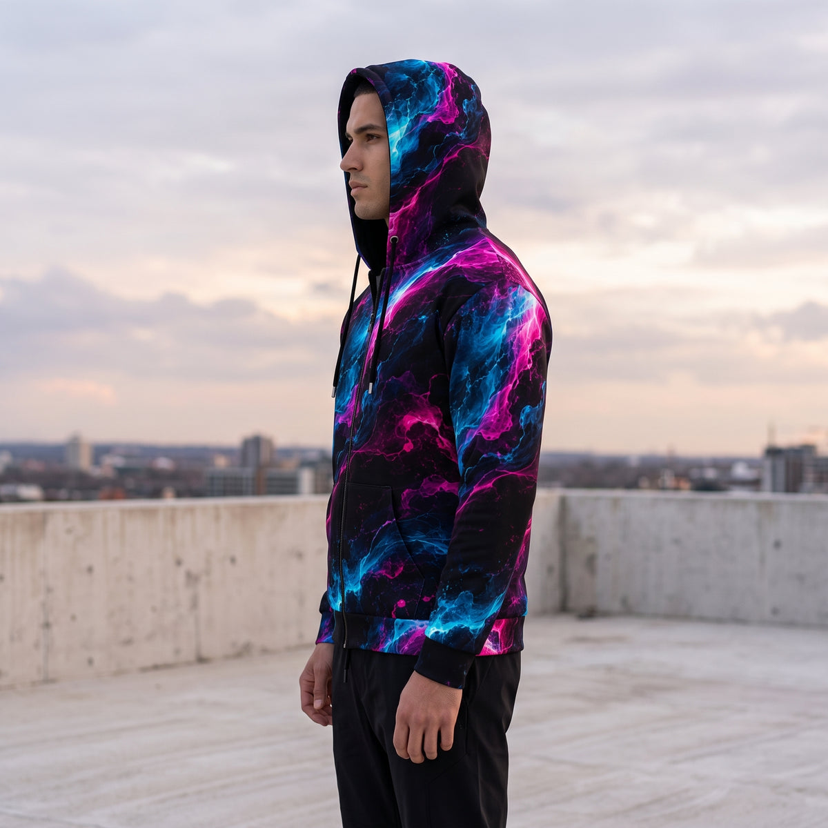 Man wearing the Neon Vortex all-over print zip hoodie