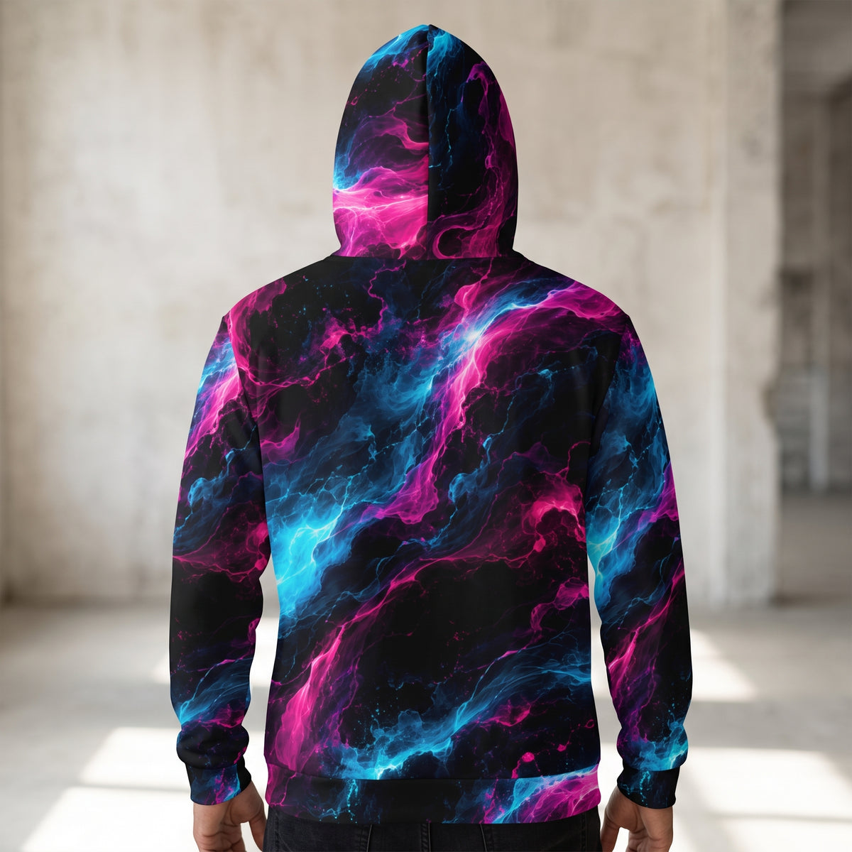 Man wearing the Neon Vortex zip hoodie, cyan and magenta print