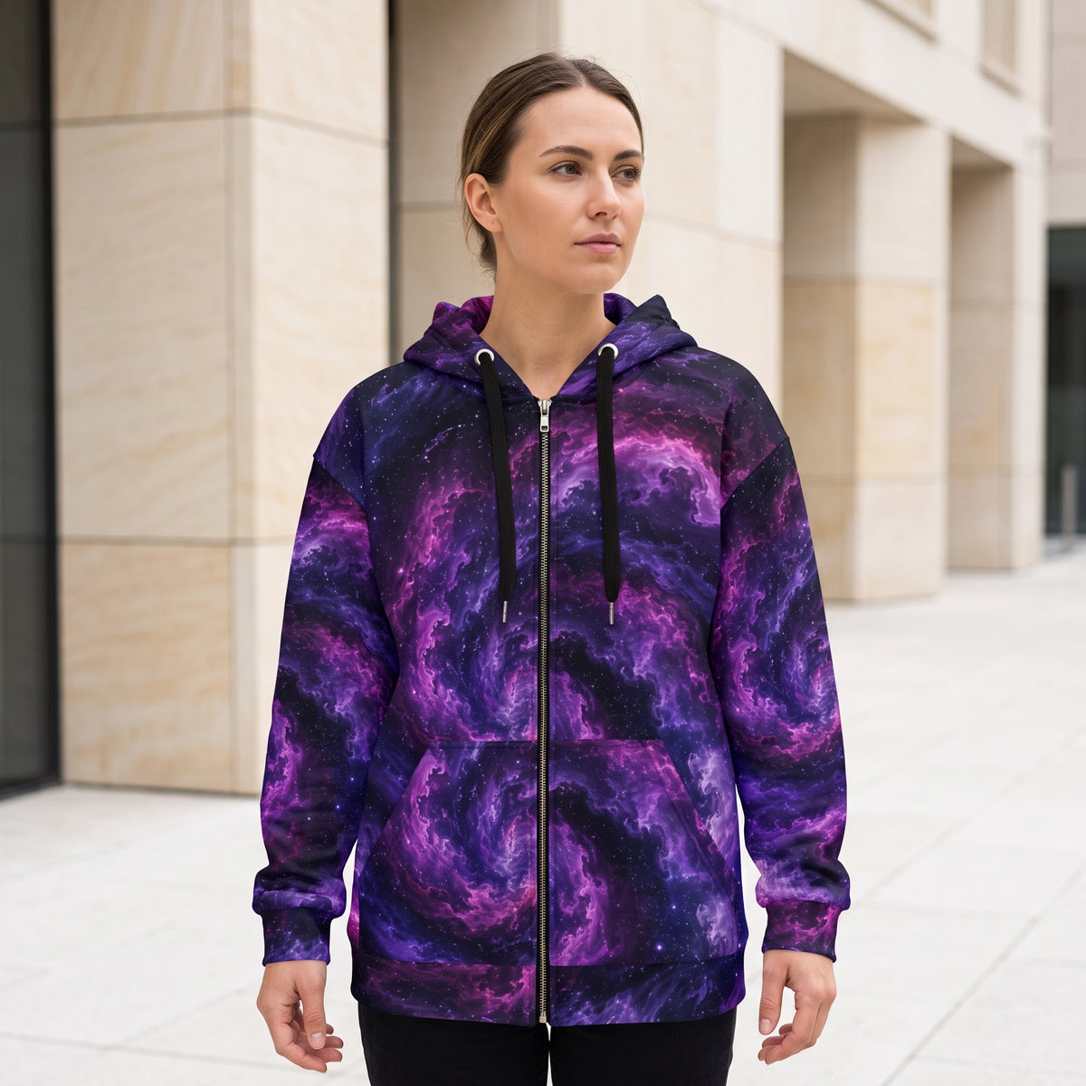 Model wearing the Cosmic Vortex zip hoodie – violet, purple and black nebula print