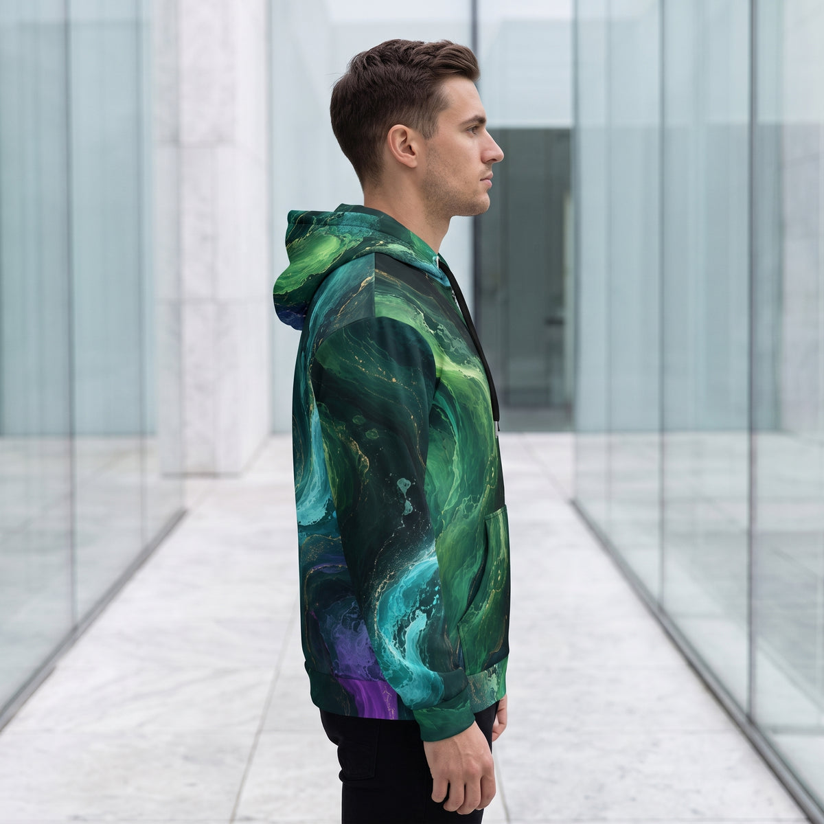 Model wearing the Emerald Tides zip hoodie – emerald, turquoise and midnight blue abstract print