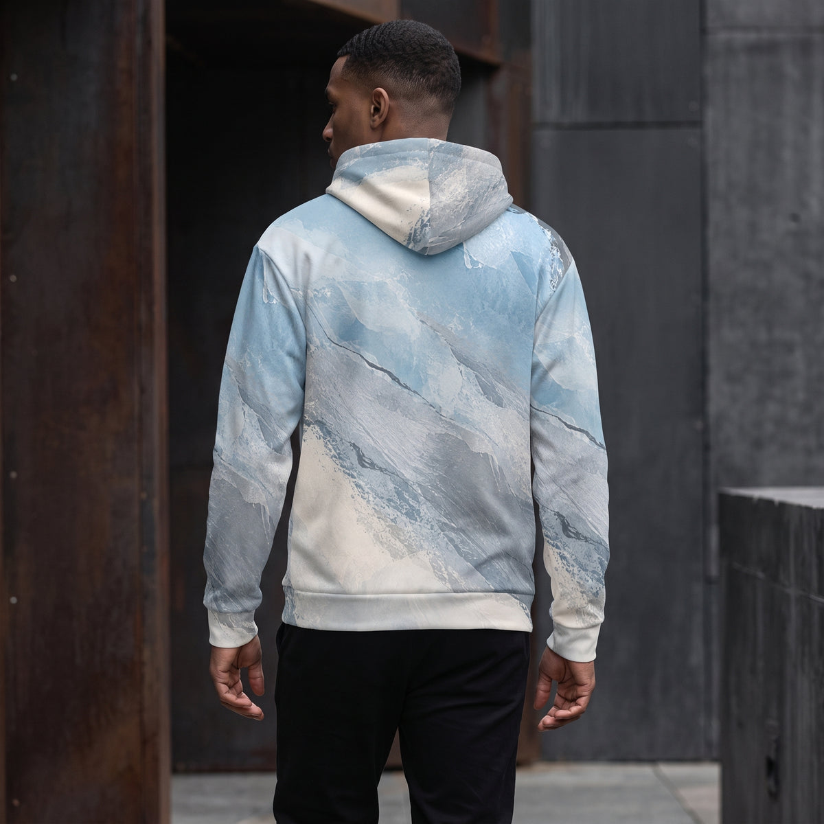 Model walking in the Glacial Current hoodie, icy blue and grey print