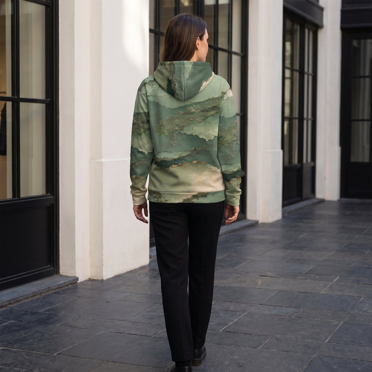 Model walking in the Verdant Terrain all-over print hoodie