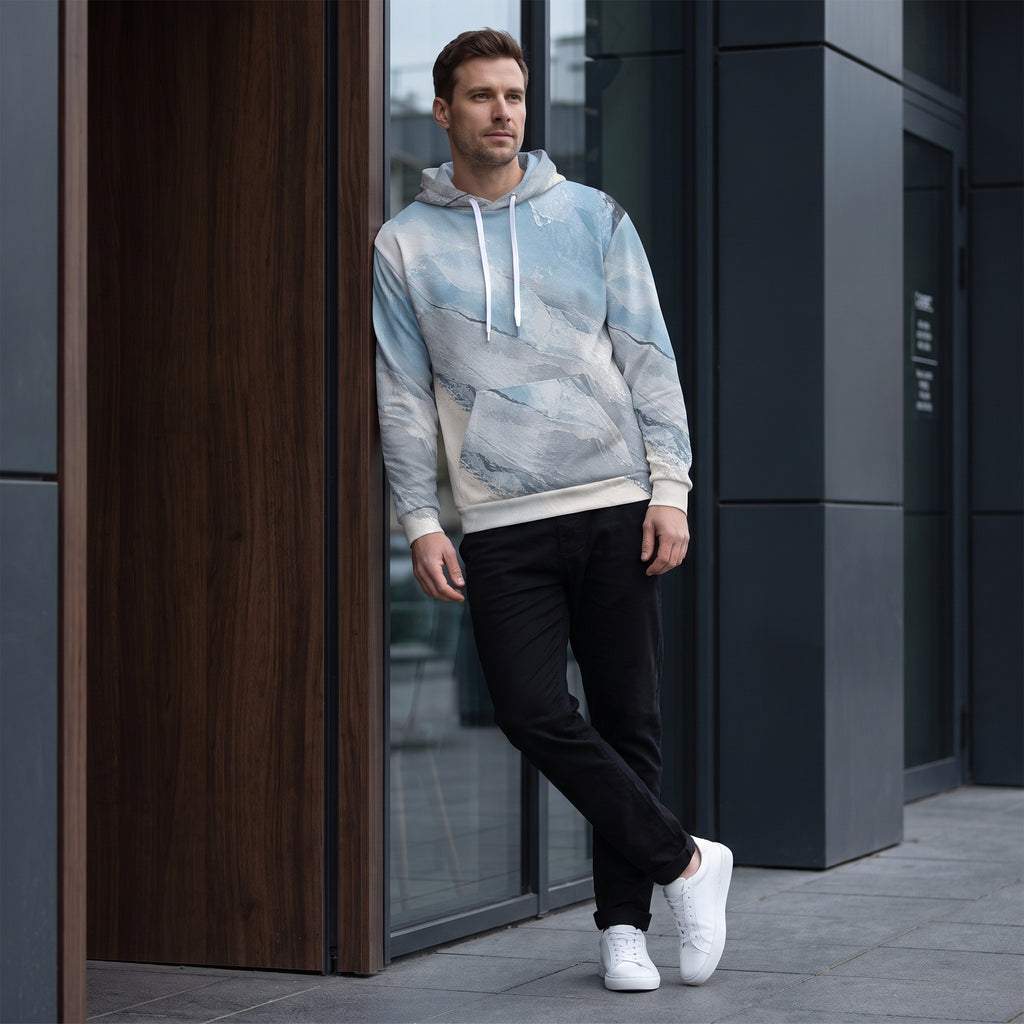 Model wearing the Glacial Current hoodie – icy blue, white and slate grey marble print
