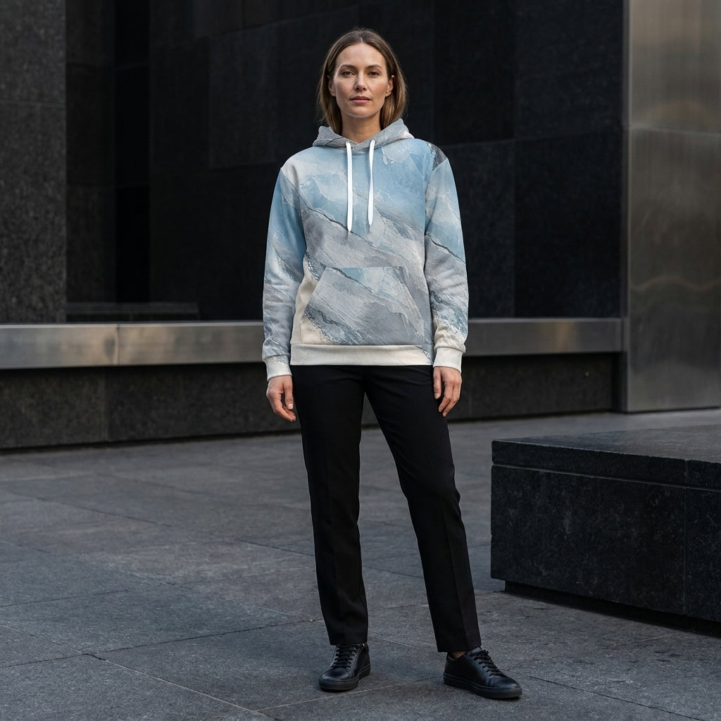 Model wearing the Glacial Current hoodie, icy blue and grey print