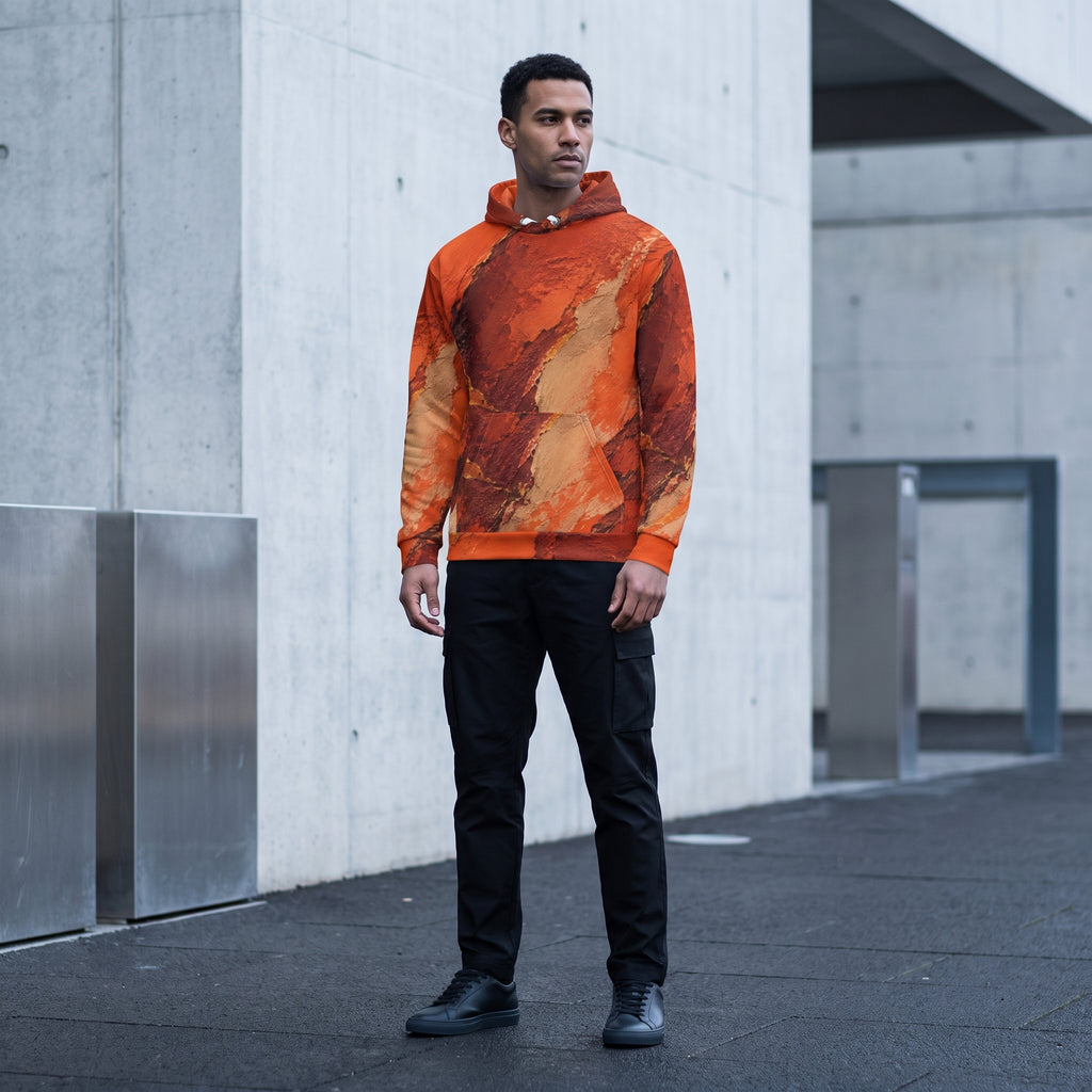 Model wearing the Ember Terrain hoodie, burnt orange and brown print