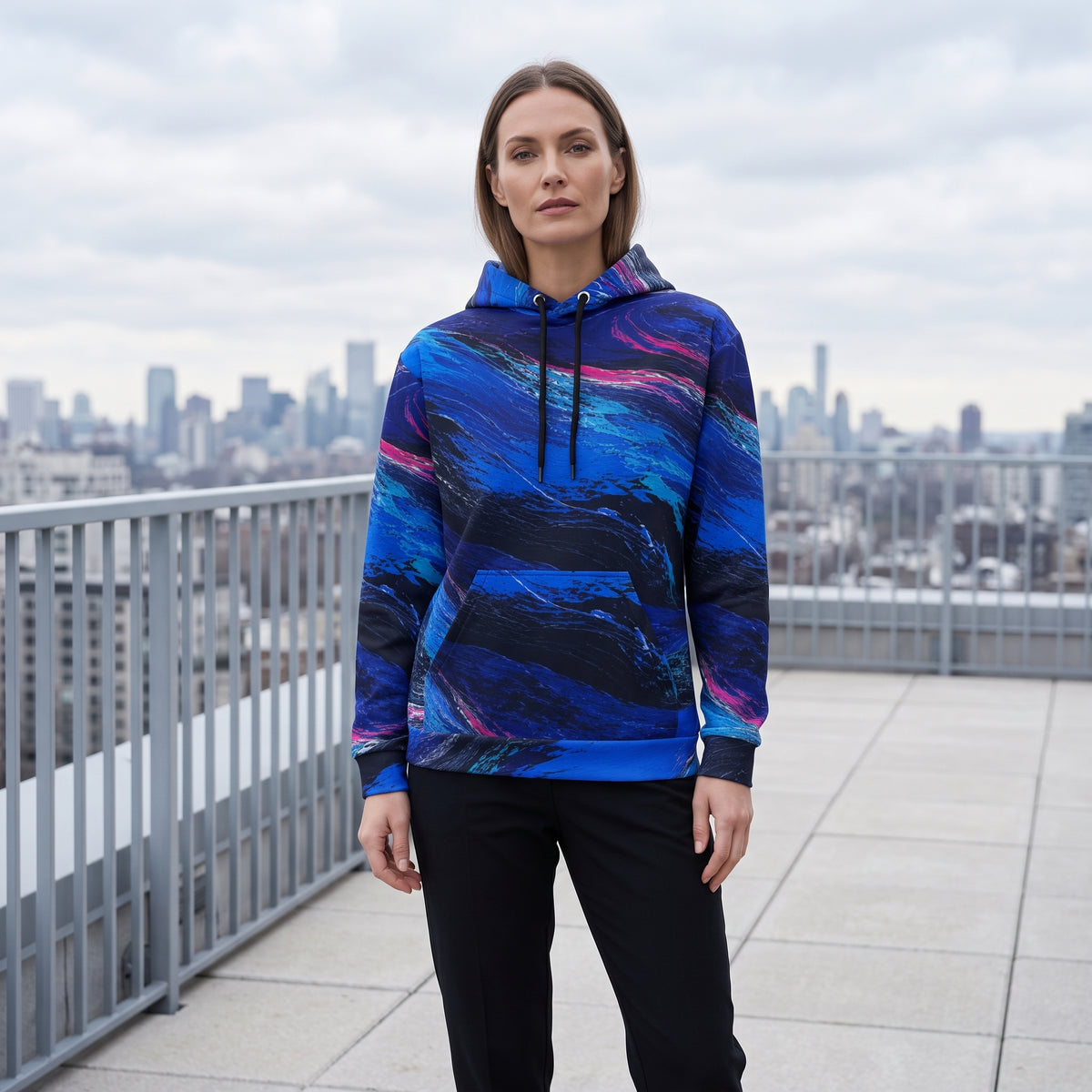 Model wearing the Cobalt Afterglow all-over print hoodie