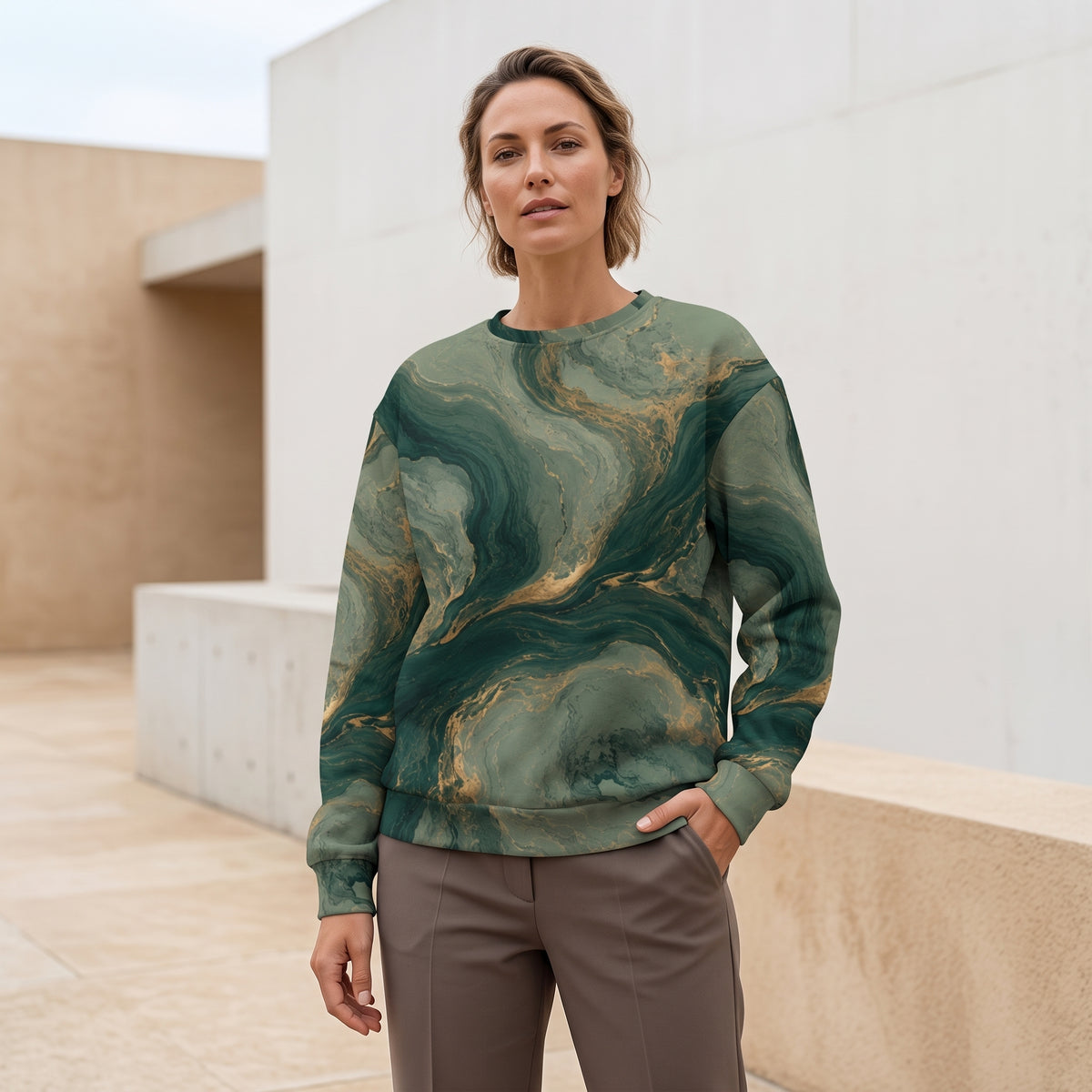 Model wearing the Emerald Current sweatshirt – forest green, sage and gold marble print