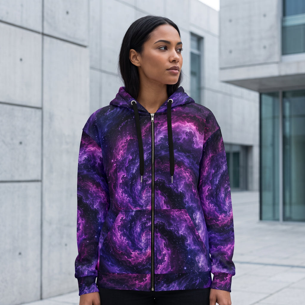 Model wearing the Cosmic Vortex zip hoodie – violet, purple and black nebula print