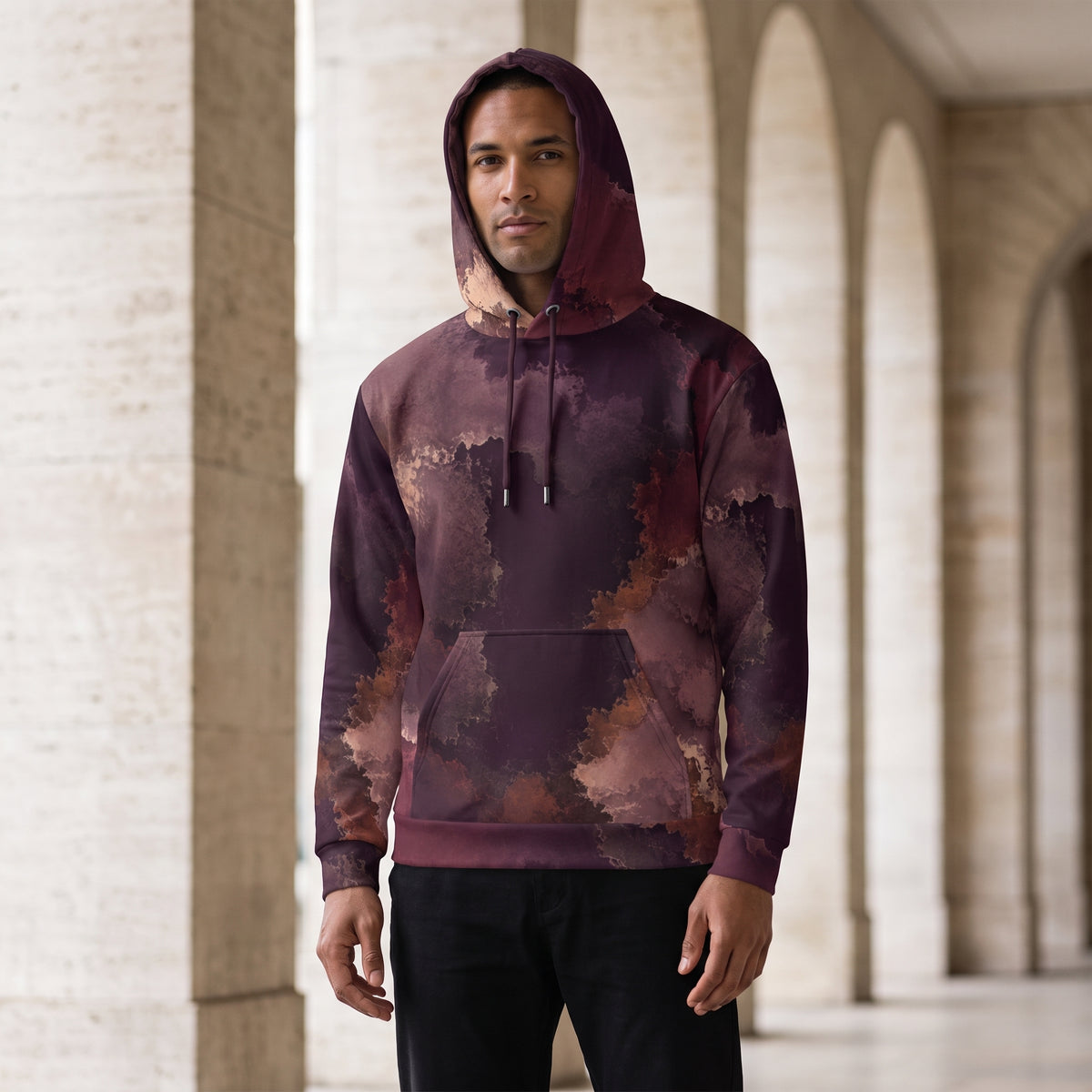 Model wearing the Ember Eclipse hoodie – burgundy, plum and copper abstract print
