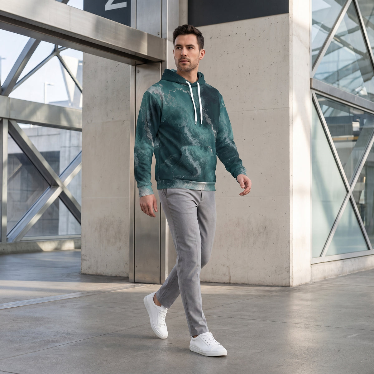 Model wearing the Abyssal Current hoodie in a streetwear look