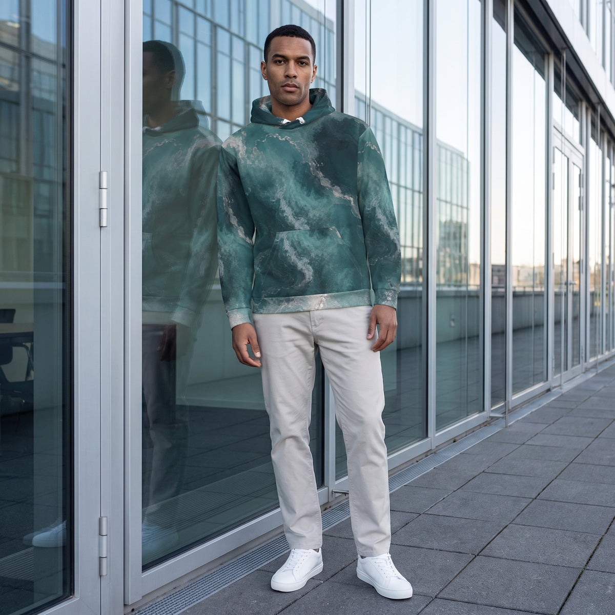 Model wearing the Abyssal Current teal abstract hoodie