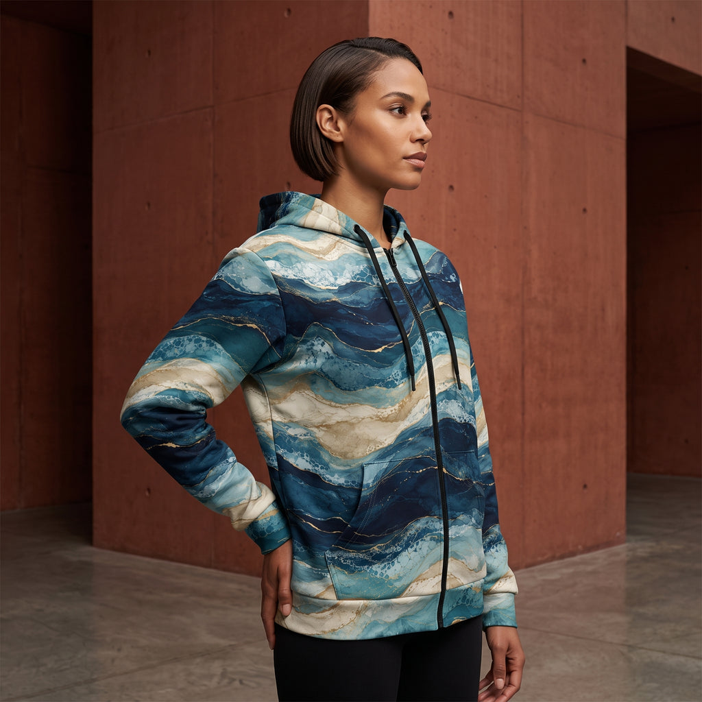 Model wearing the Oceanic Strata zip hoodie, navy and teal print