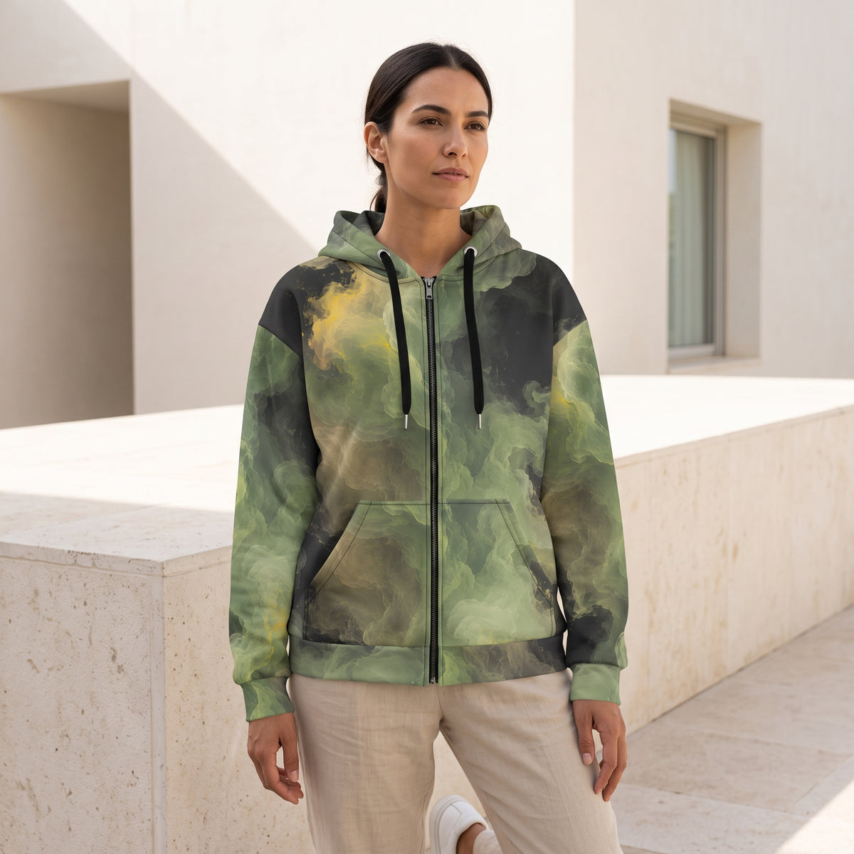 Model wearing the Verdant Shadow zip hoodie – olive green, charcoal and moss abstract camo print