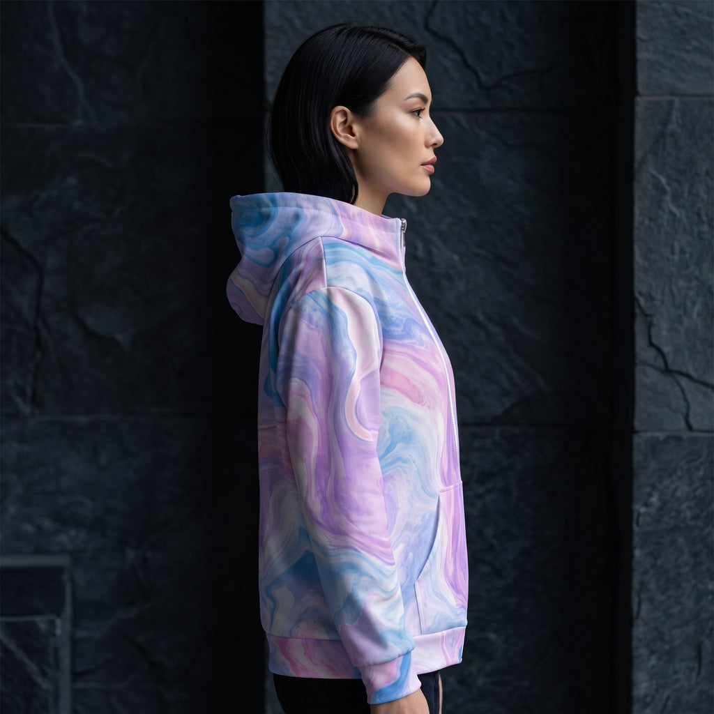 Model wearing the Pastel Mirage zip hoodie, pastel print
