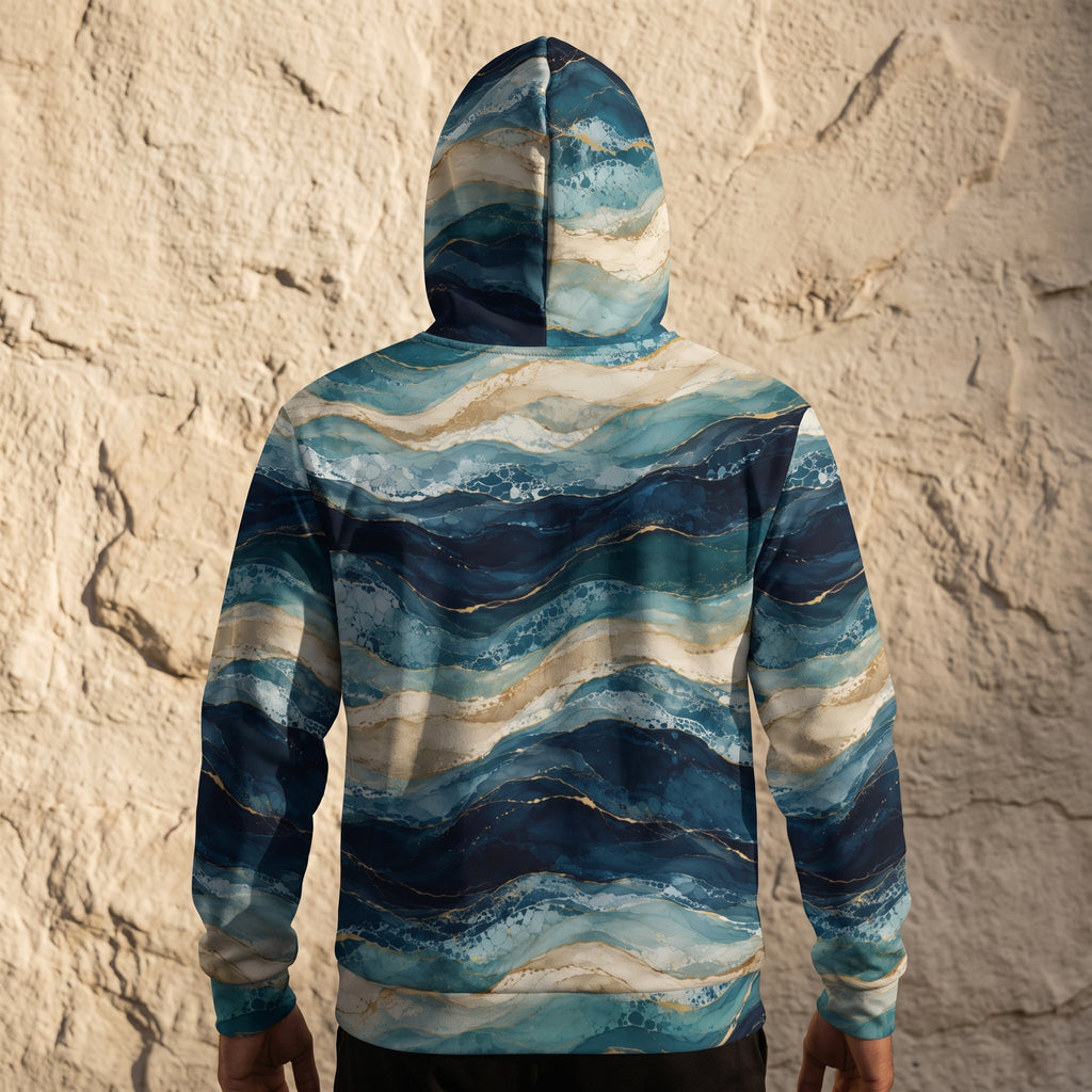 Model wearing the Oceanic Strata zip hoodie, navy and teal print