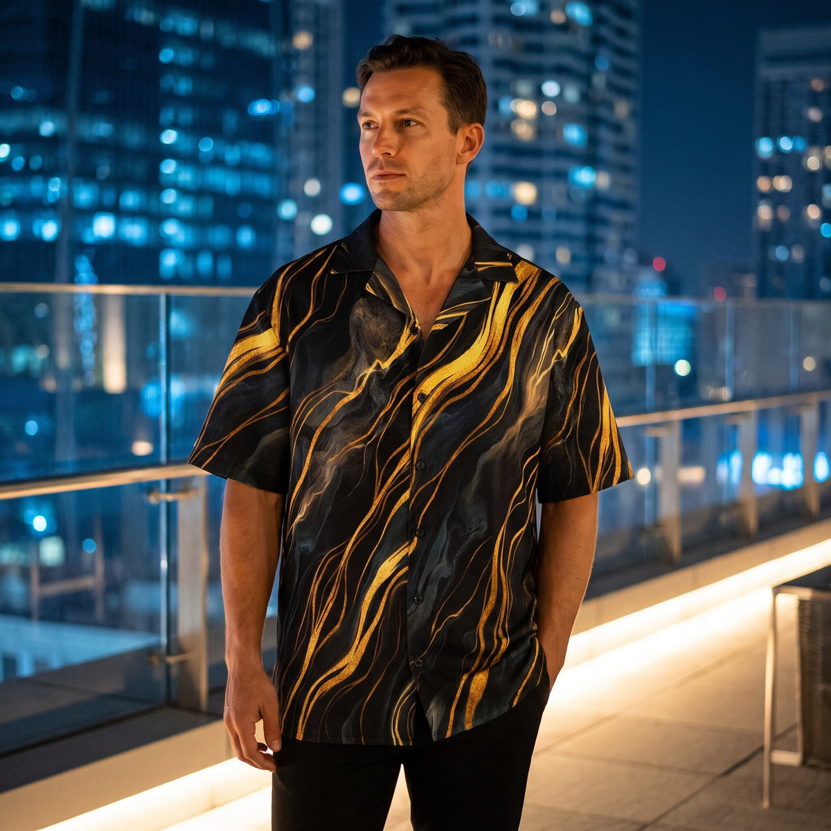 Black and gold button-up shirt worn on a rooftop at night