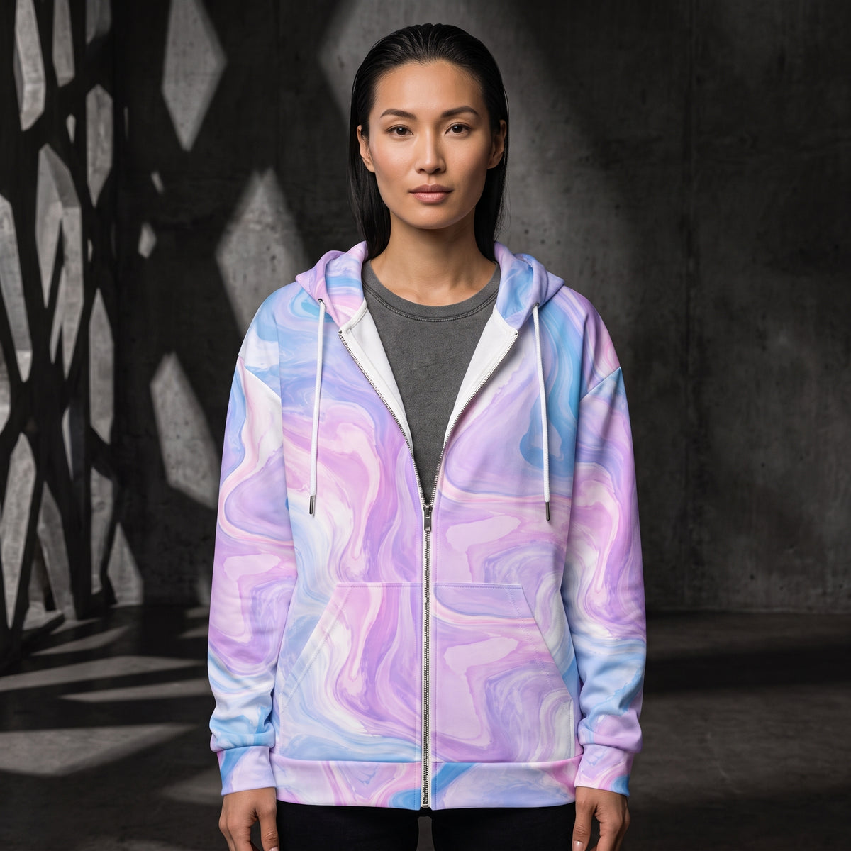 Woman wearing the Pastel Mirage all-over print zip hoodie