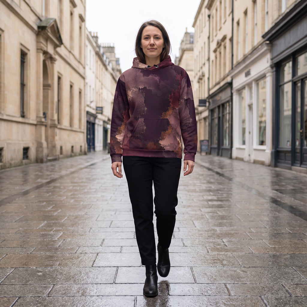 Woman walking in the Ember Eclipse hoodie, burgundy and plum print