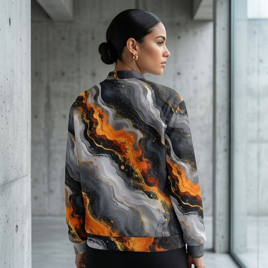 Woman wearing the Molten Obsidian bomber jacket, charcoal and orange print