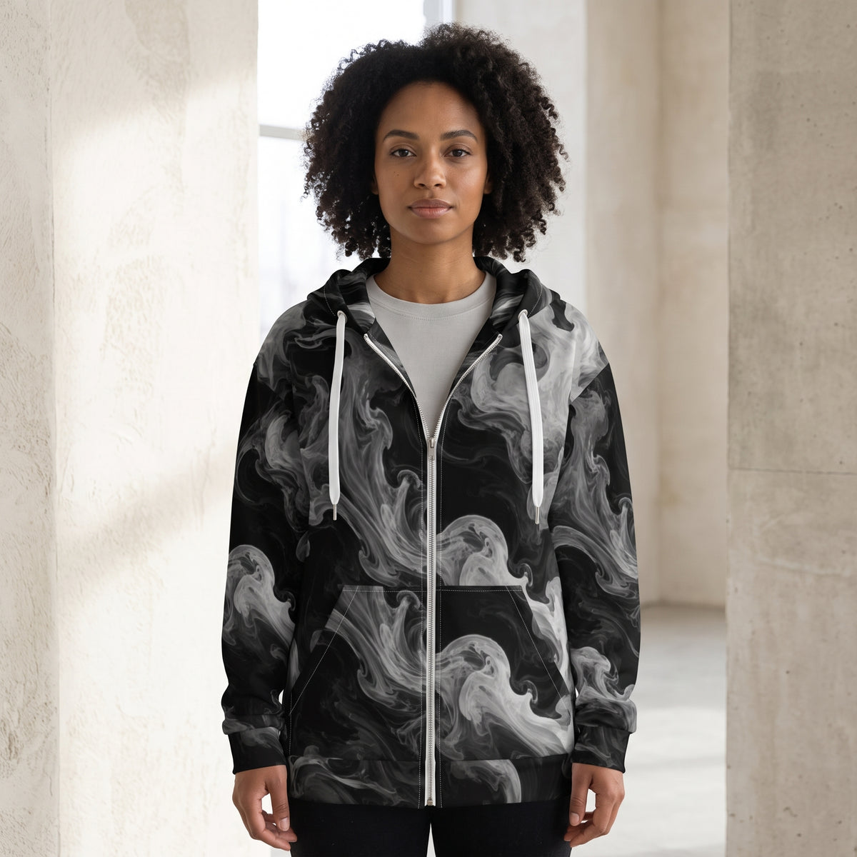 Woman wearing the Phantom Smoke zip hoodie, black and grey print