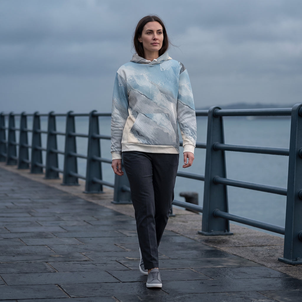 Woman wearing the Glacial Current hoodie, icy blue and grey print