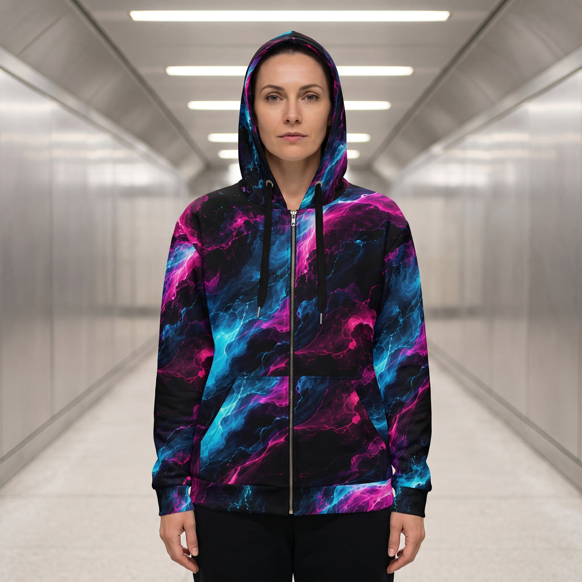 Woman wearing the Neon Vortex all-over print zip hoodie