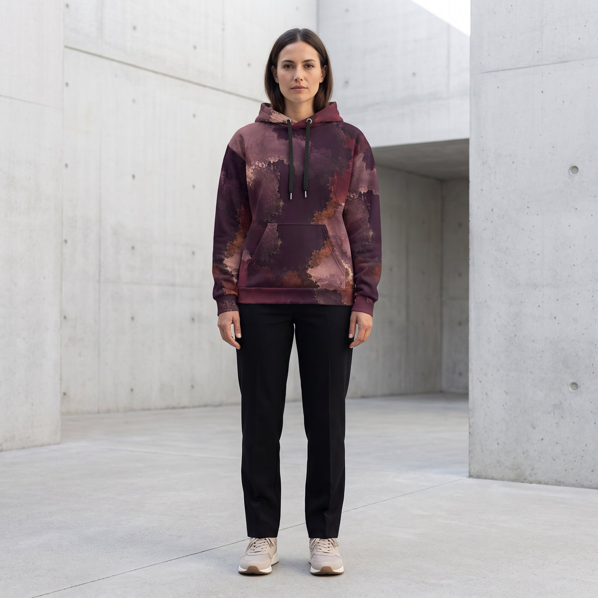 Woman wearing the Ember Eclipse hoodie, burgundy and plum print