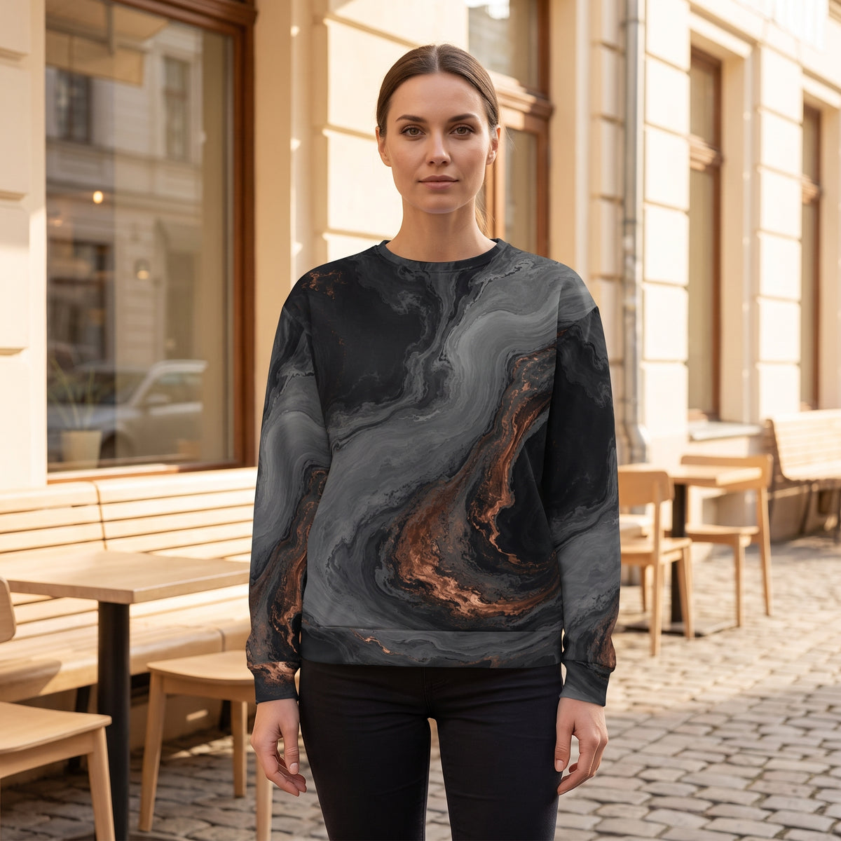 Woman wearing the Molten Obsidian all-over print sweatshirt in a café