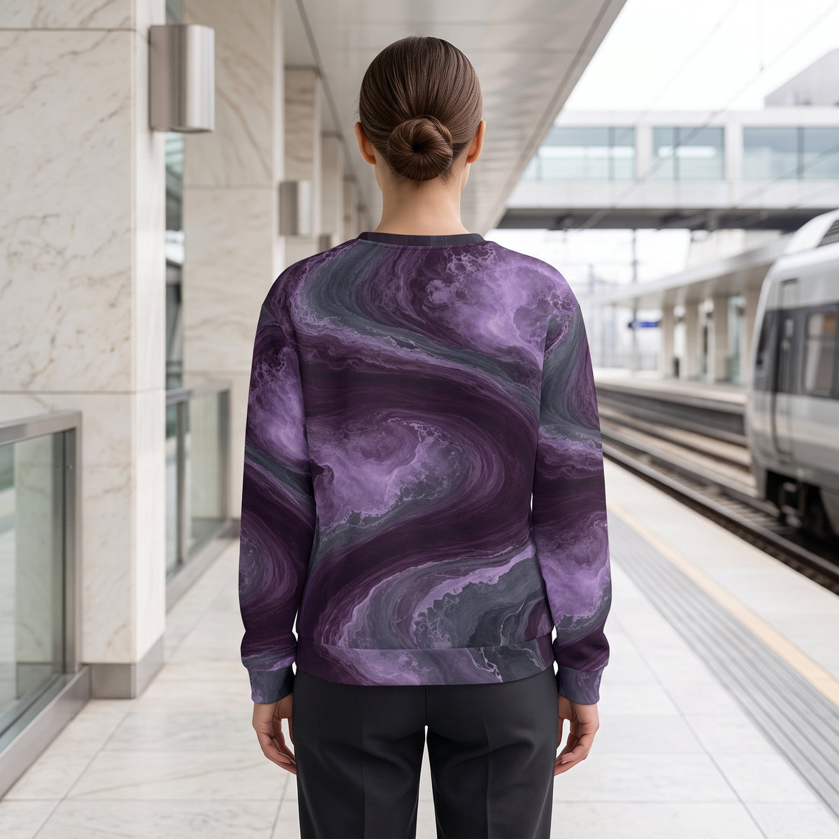 Woman walking in the Amethyst Vortex sweatshirt – amethyst purple, charcoal and plum marble print