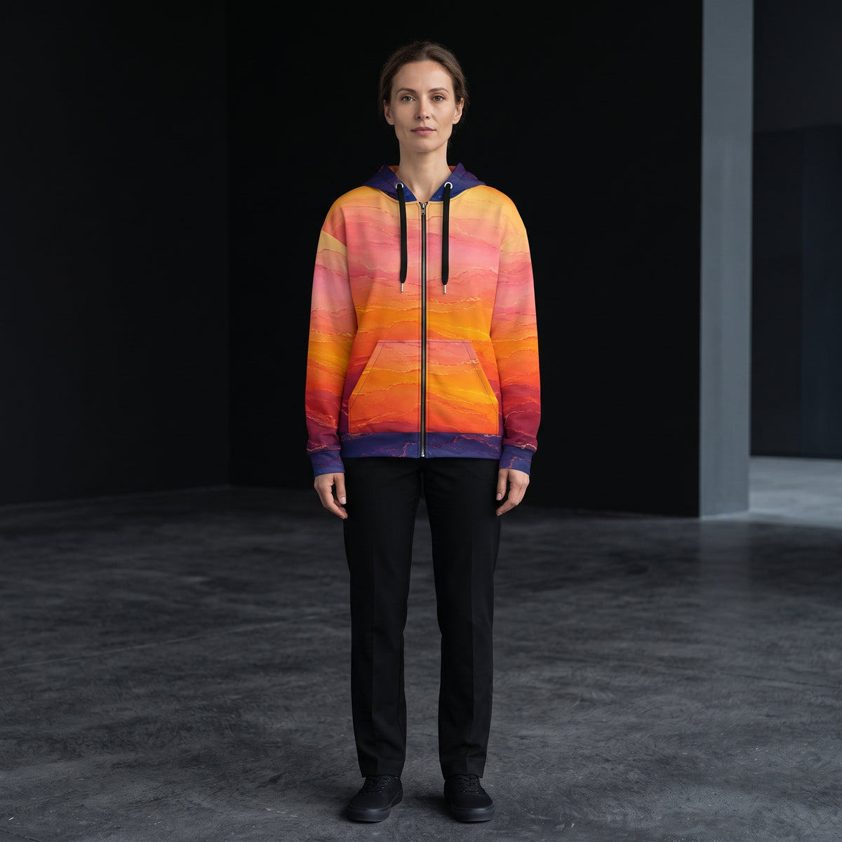Woman wearing the Solar Horizon zip hoodie, sunset gradient print